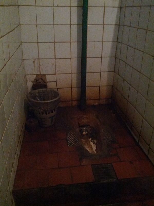 Public toilet. Squat toilets are convenient for public places, but it better whith water hose.